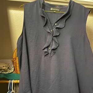 Navy blue dress top with ruffle. Only wore a couple times. Nothing wrong
